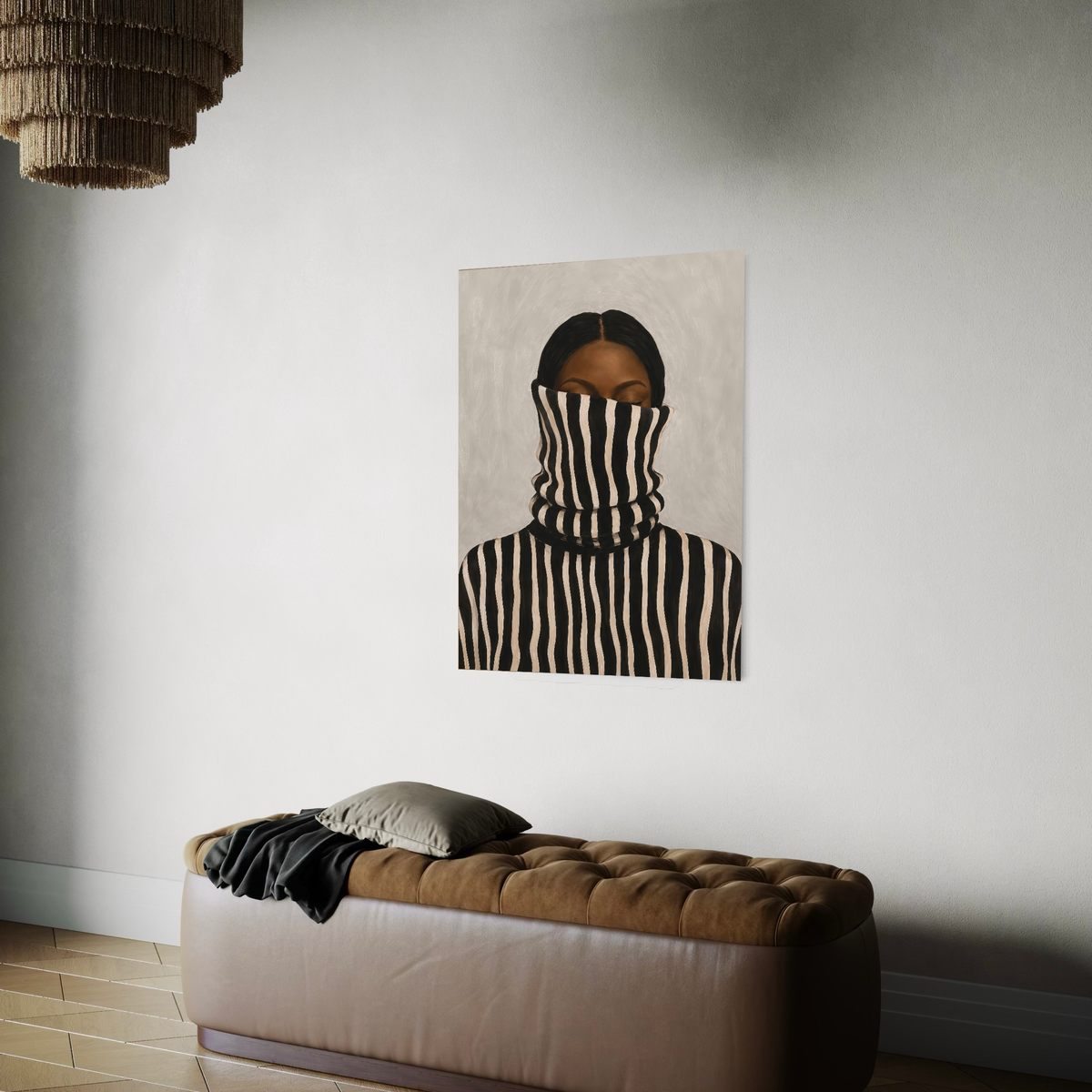 Afrocentric female portrait displayed above an upholstered bench in a neutral bedroom