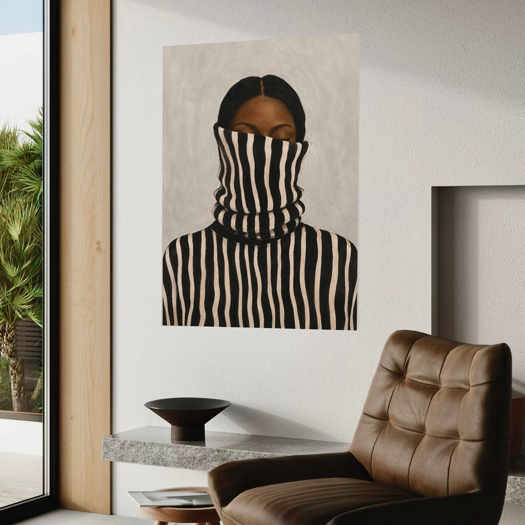 Black and cream striped woman portrait beside a brown leather chair in a modern interior