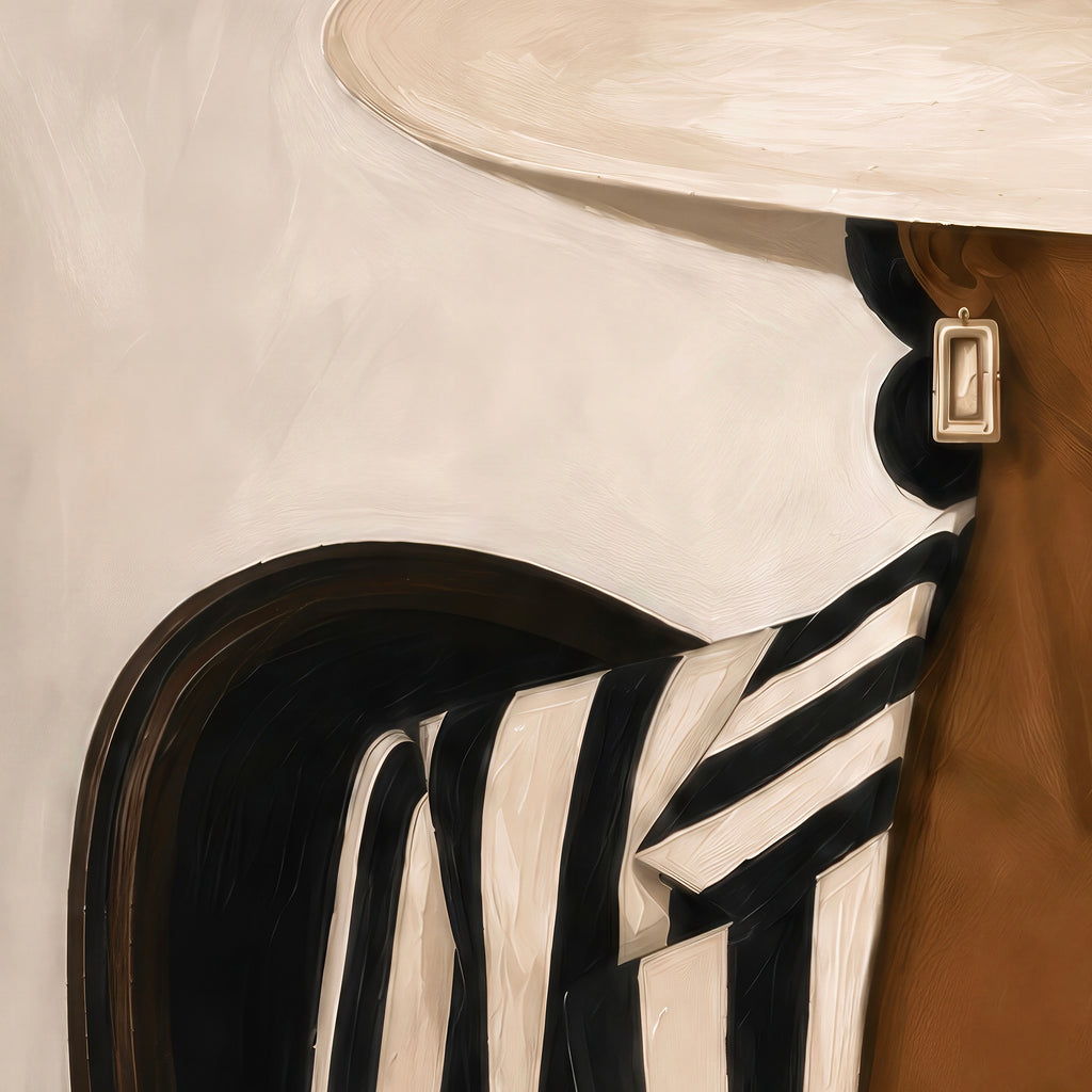 Detail of a Black woman fashion portrait wearing a wide cream hat and striped blazer.
