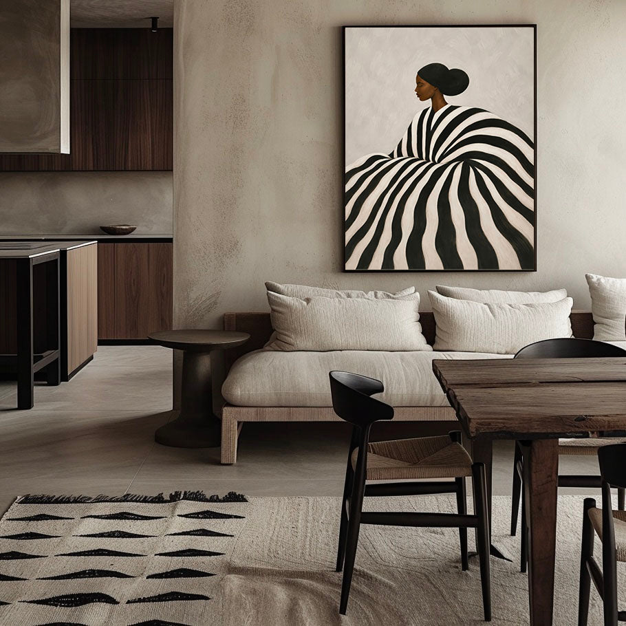 Framed Black woman portrait poster with a sculptural striped dress.