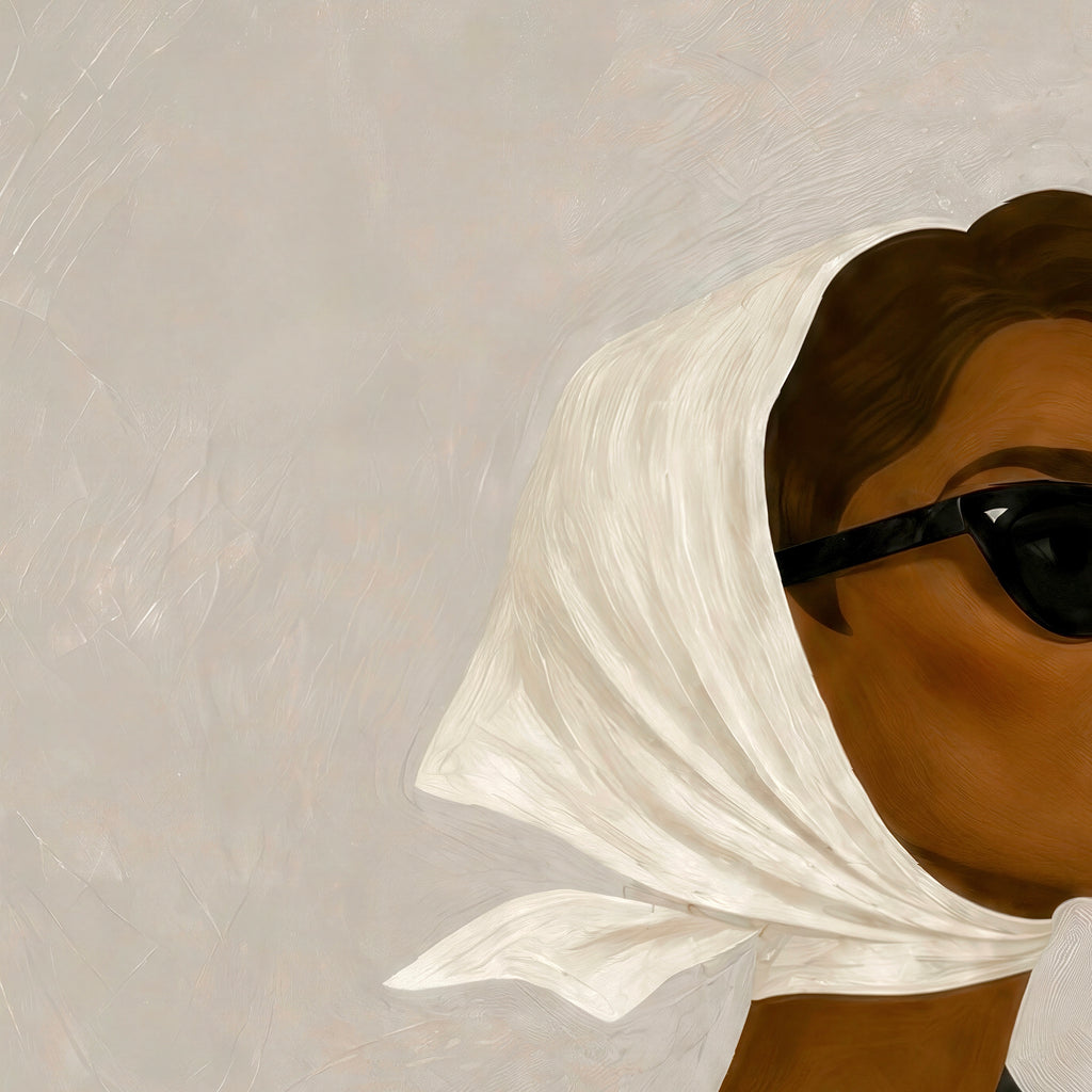 Detail of a Black woman fashion portrait wearing a white headscarf and sunglasses.