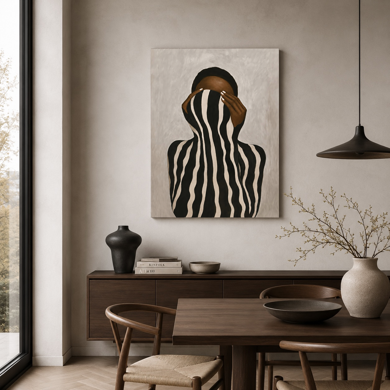Abstract Black woman striped canvas wall art displayed above a modern dining table