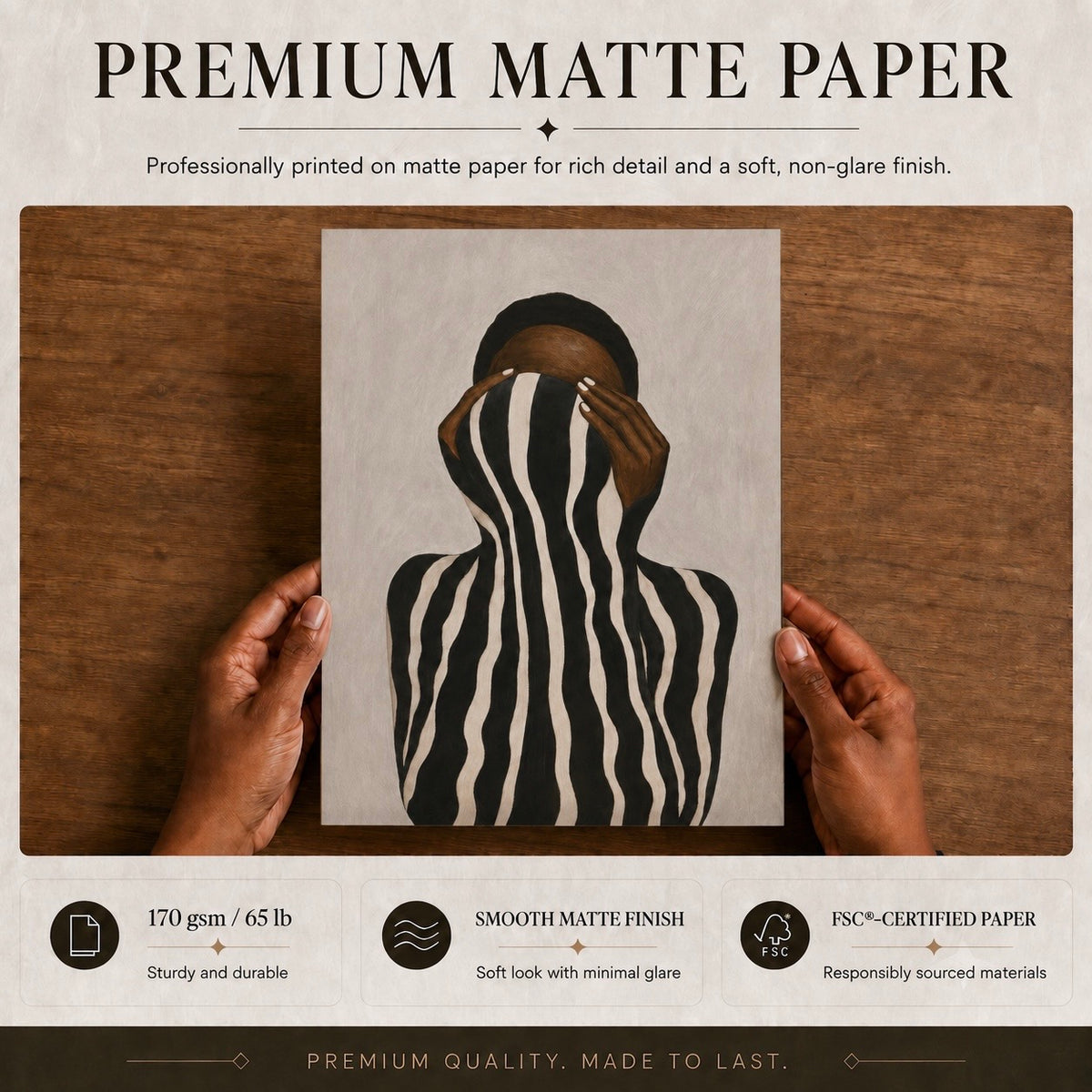 Paper quality details for an poster featuring an abstract African female figure wrapped in black and ivory stripes