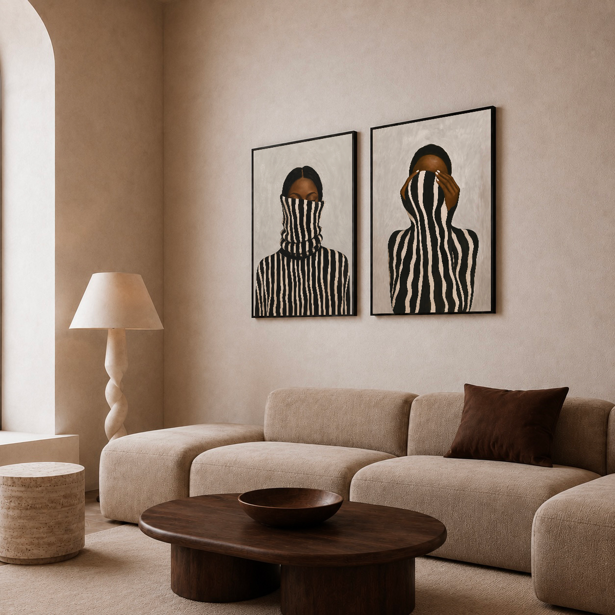 Set of two framed posters featuring Black women in striped clothing in a neutral living room.